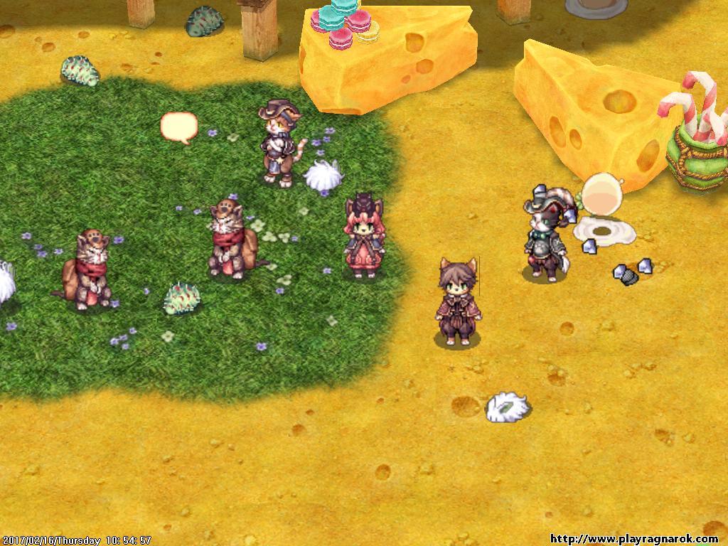 Ragnarok Online in-game screenshot showing Doram cat-race characters gathered on a map with giant cheese-wedge event props
